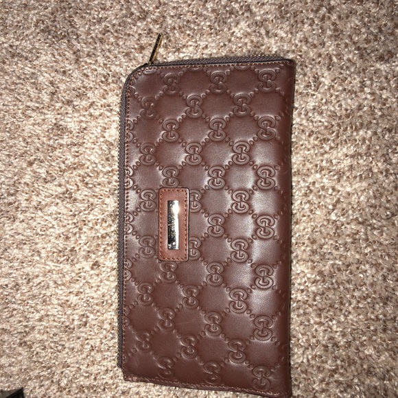 Gucci Handbags - Authentic Leather Brown Monogram leather wallet